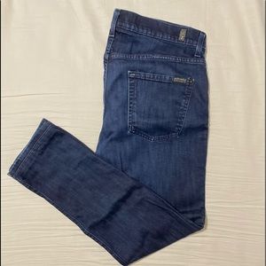 Seven for all Mankind blue jeans.